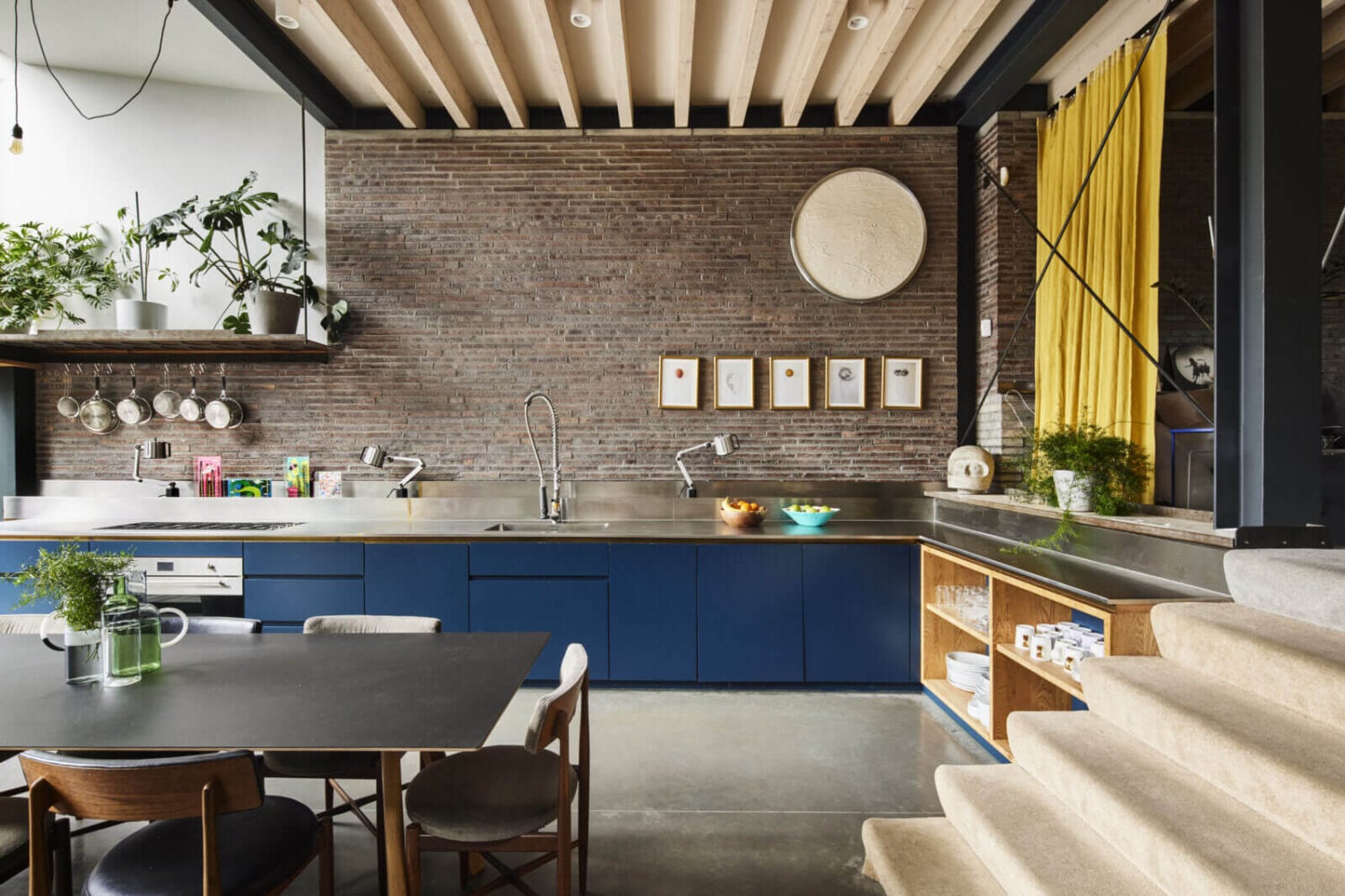The Makers House: A Modern Achitectural Home in London 6 split-level-living-space-blue-kitchen-brick-wall-the-makers-house-london