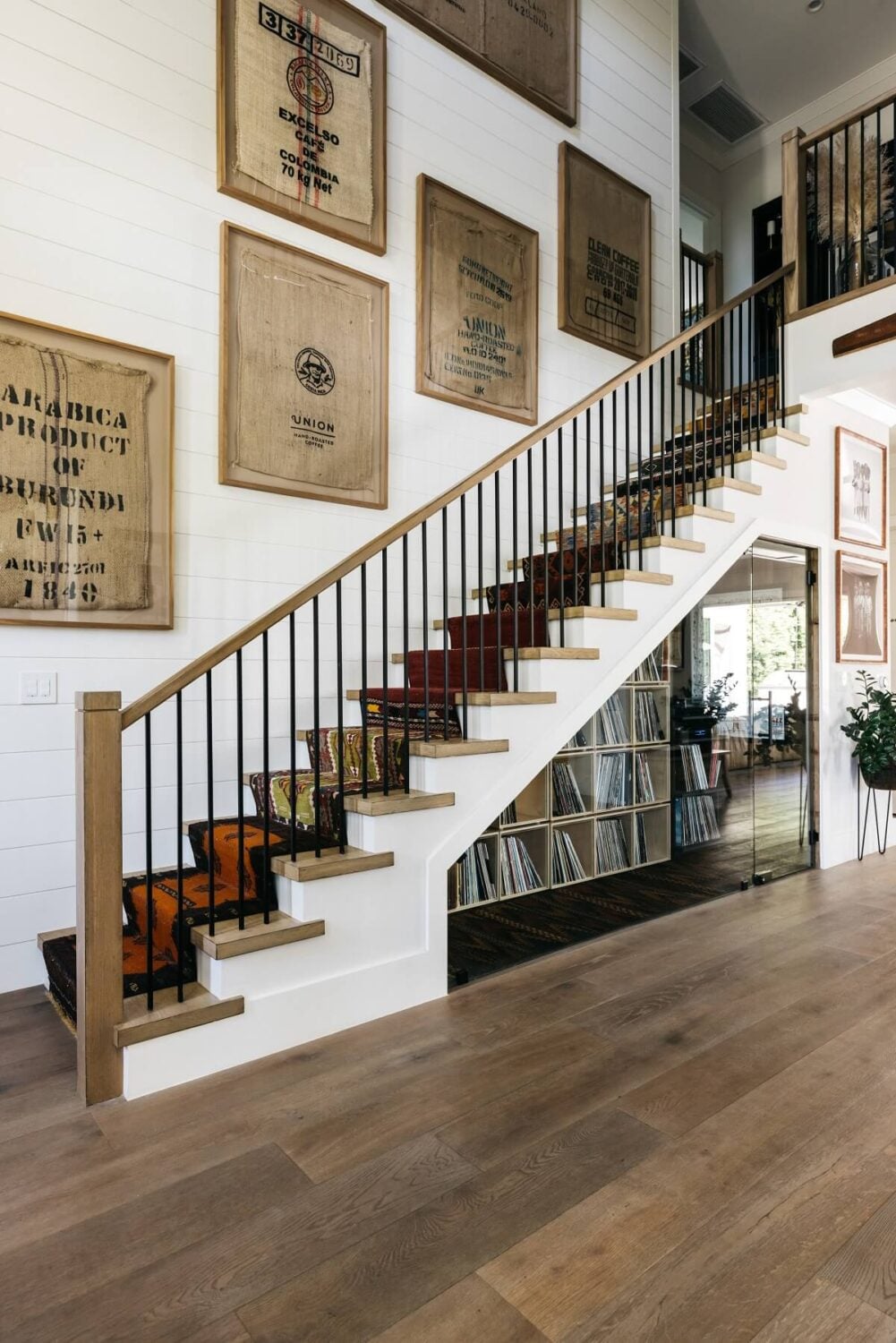 The Los Angeles Home of Emmy Raver-Lampman and Daveed Diggs 13 stairs-underneath-storage-music-collection-daveed-diggs-emmy-raver-lampman-nordroom