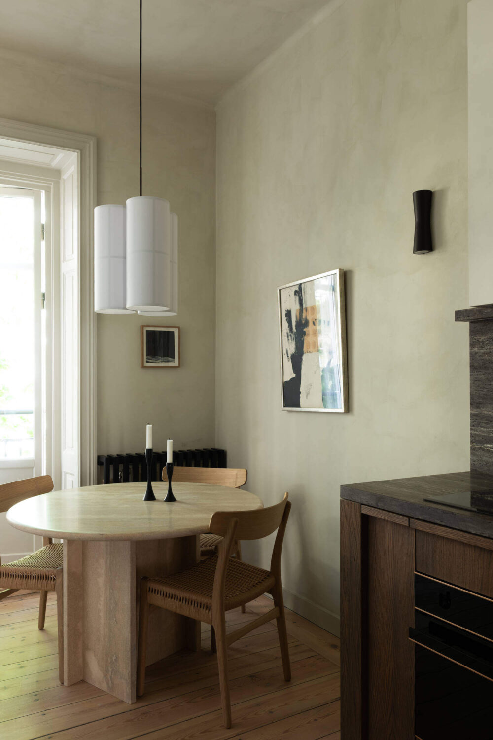 Japandi Interior Design in a Small Nordic Home 13 wabi-sabi-round-dining-table-nordroom