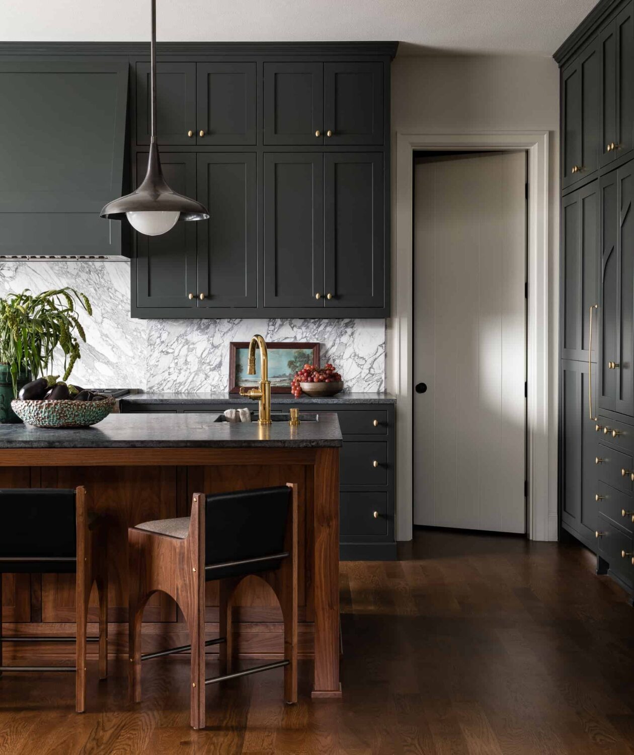 A Warm Family Home on Fox Island 3 Heidi-Caillier-Design-luxury-interior-designer-dark-kitchen-wood-island