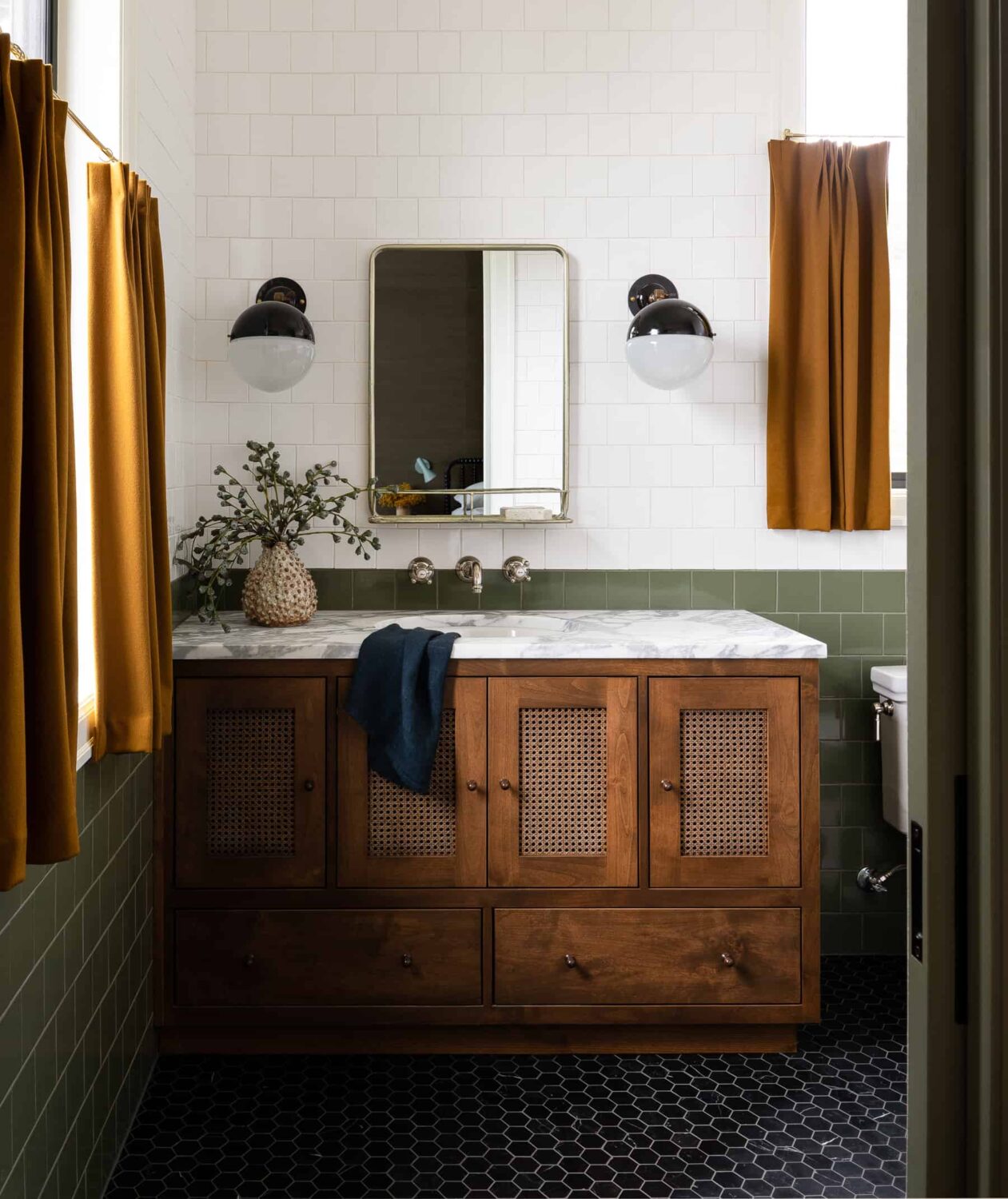 A Warm Family Home on Fox Island 26 Heidi-Caillier-Design-luxury-interior-designer-green-bathroom-caned-vanity