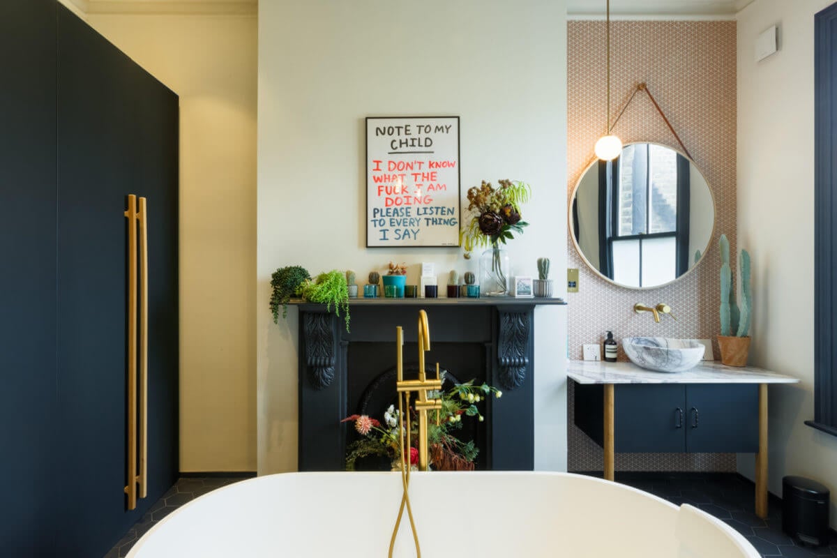 A Combination of Styles and Color in a London Townhouse 23 bathroom-blue-accents-freestanding-bath-round-mirror-nordroom