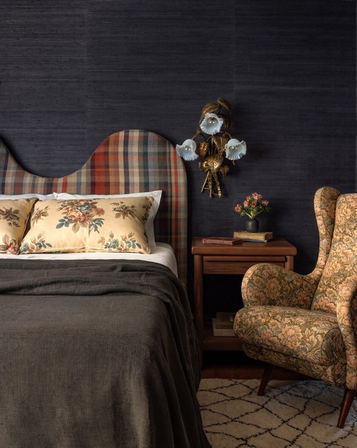 Pink Tones and Black in a Stunning Fox Island Home 14 bedroom-curved-plaid-headboard-black-walls-nordroom