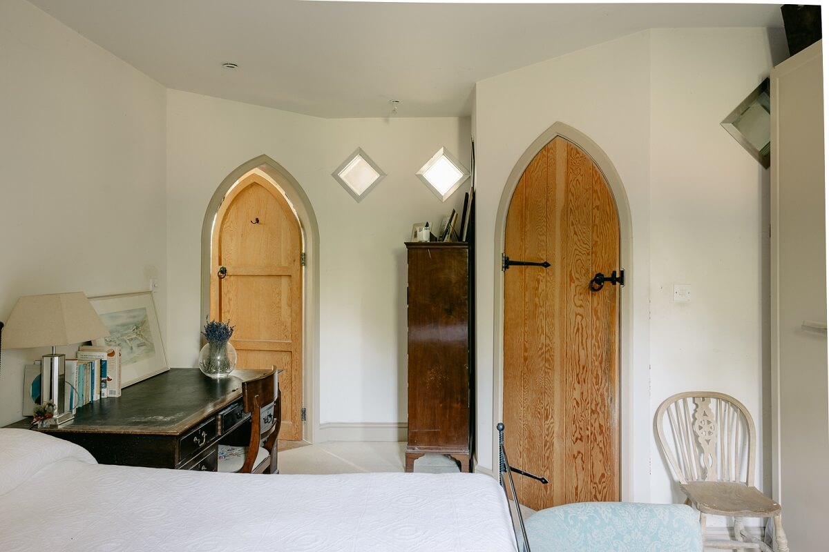 A Warm Church Conversion in England 17 bedroom-original-wooden-church-doors-nordroom