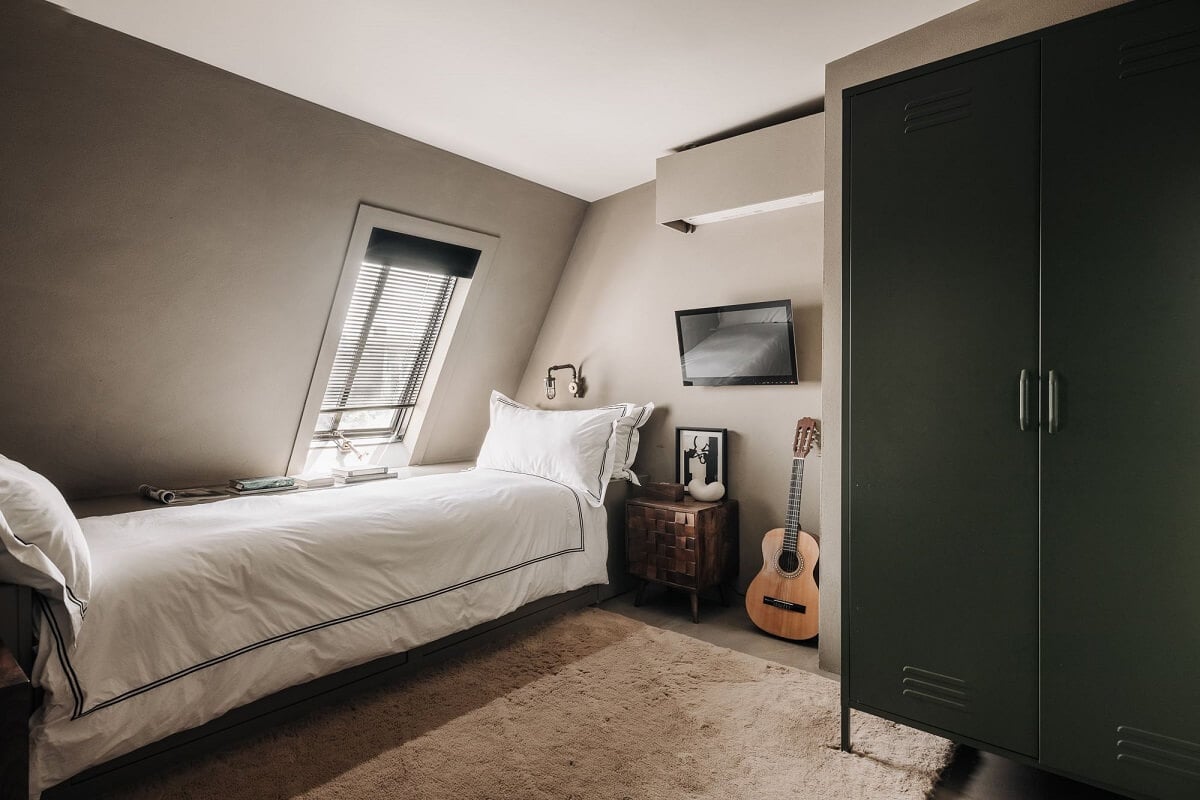 Light Gray Design Apartment in Amsterdam 21 bedroom-sloped-ceiling-green-wardrobe-nordroom