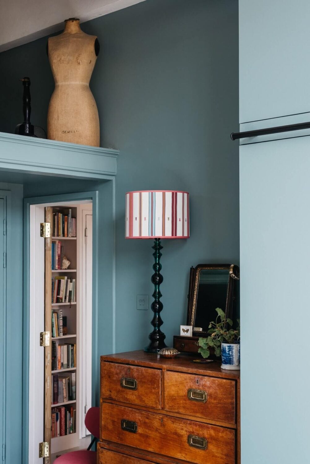 A Loft-Style Apartment with Brick Walls in London 17 bedroom-vintage-dresser-blue-walls-nordroom
