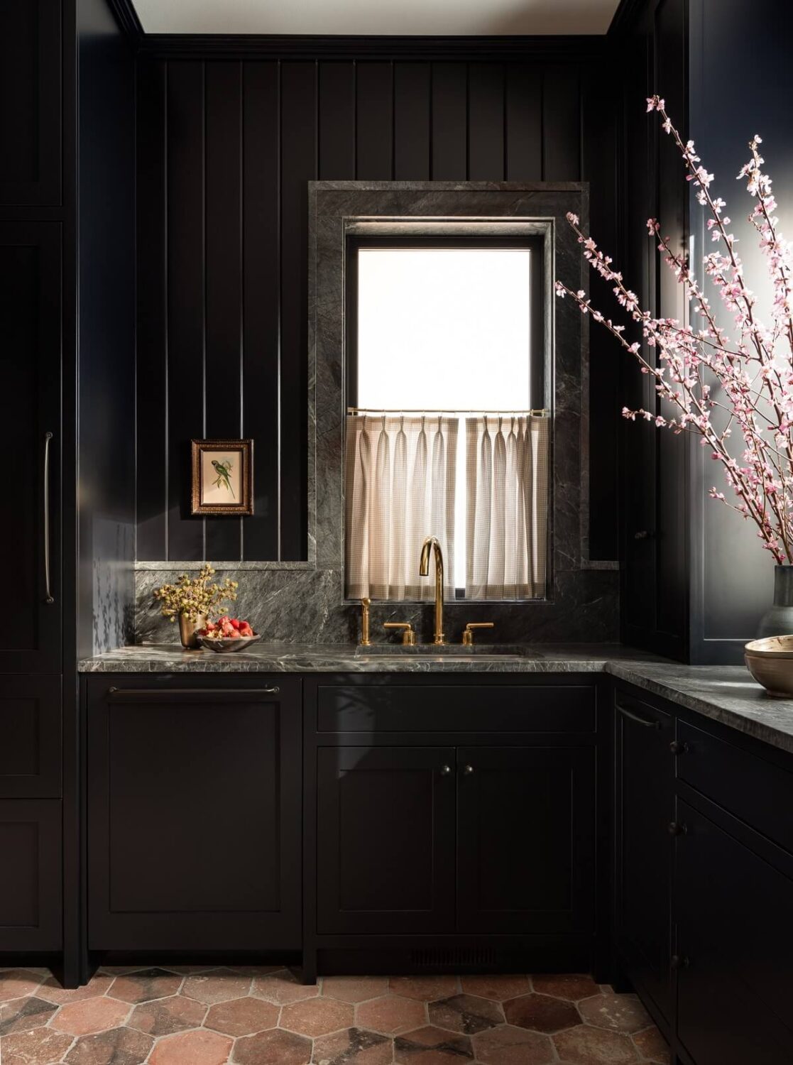 Pink Tones and Black in a Stunning Fox Island Home 9 black-kitchen-hexagon-floor-tiles-guesthouse-heidi-caillier-design-nordroom