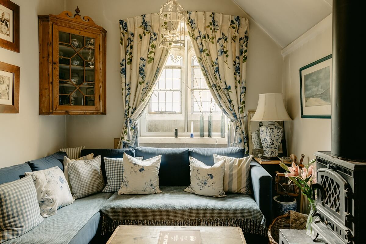 A Warm Church Conversion in England 13 cozy-sitting-room-fireplace-church-conversion-nordroom