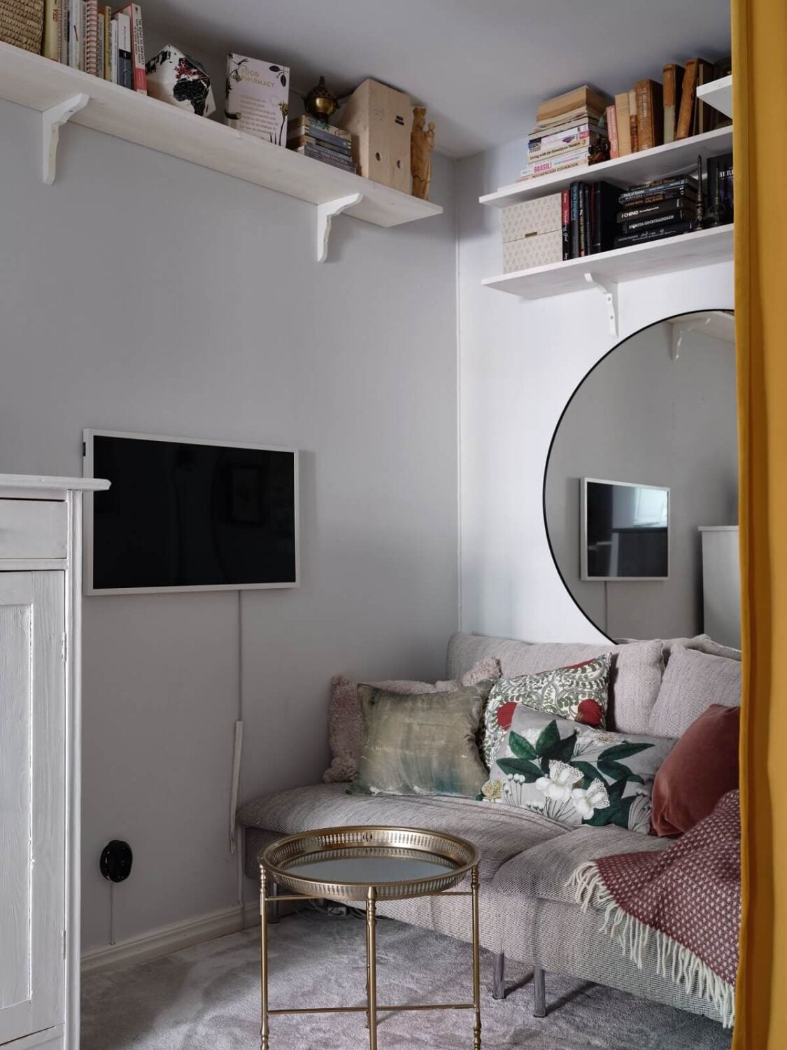 A Light Pink and Gray Nordic Home 12 cozy-tv-room-shelf-nordroom