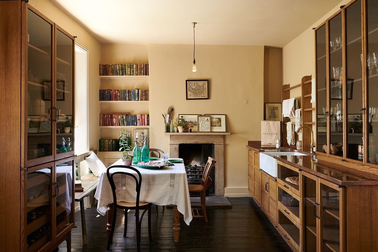 Glidden & PPG Color of the Year 2024: Limitless 18 devol-haberdasher-kitchen-warm-yellow-walls-fireplace-nordroom