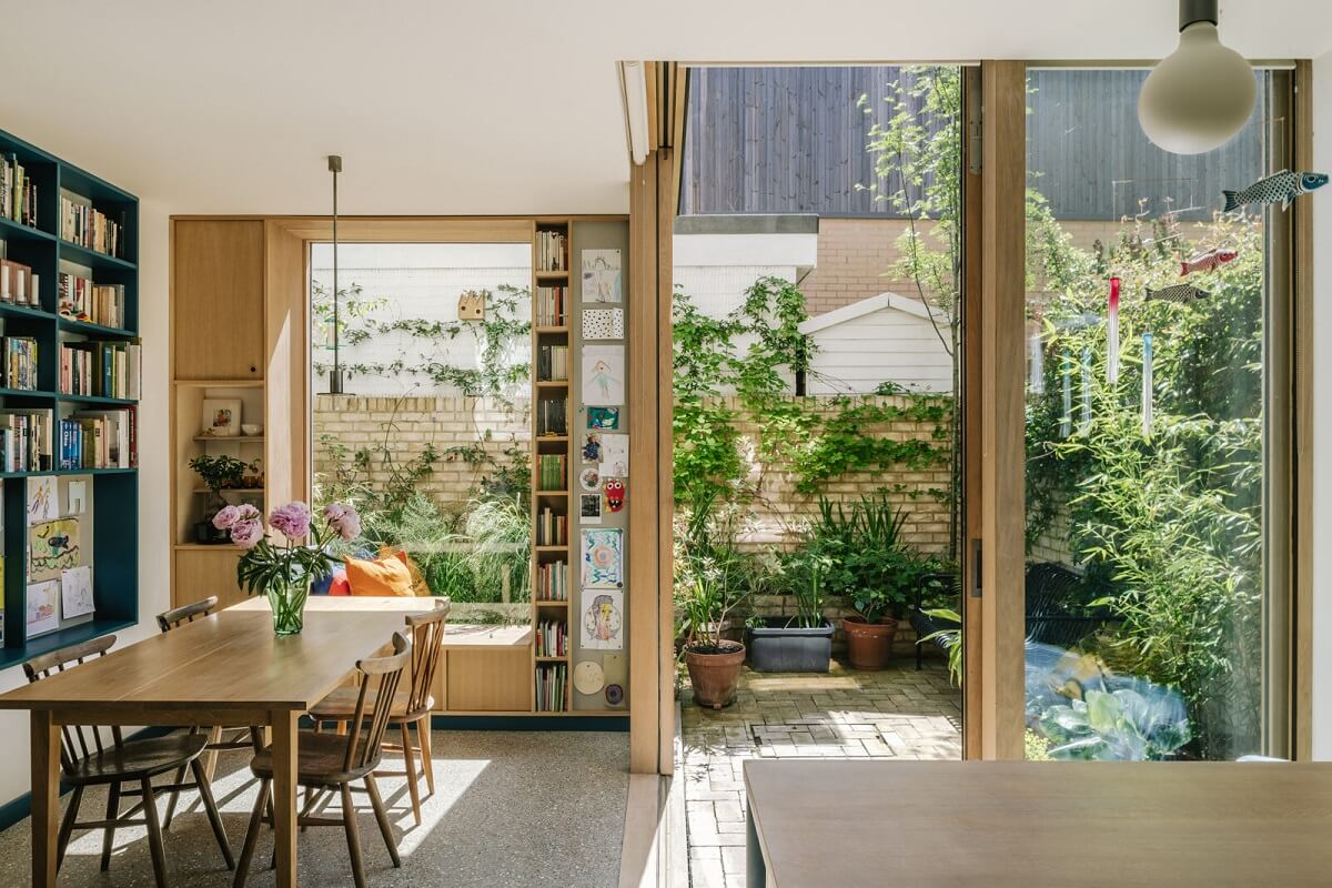 A London Townhouse with Blue Kitchen and Light Extension 4 dining-room-extension-sliding-oak-doors-garden-nordroom