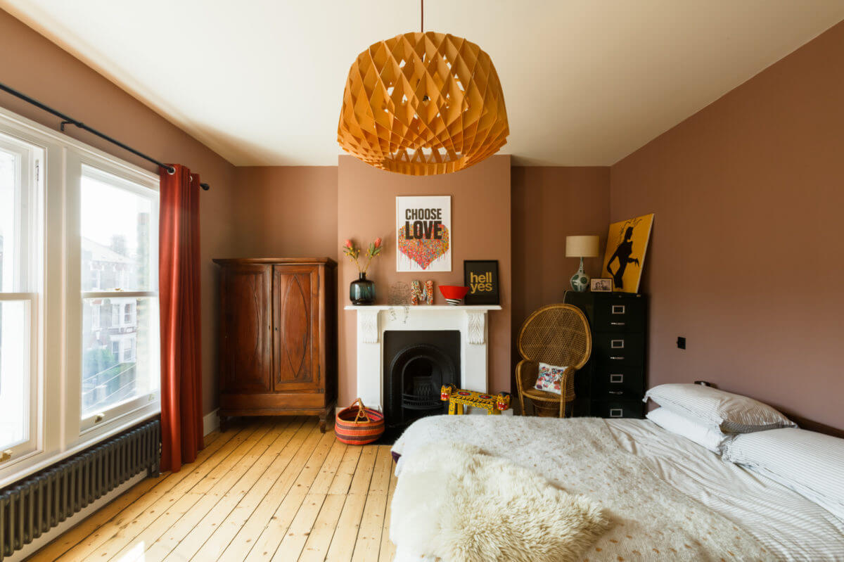 A Combination of Styles and Color in a London Townhouse 16 earthy-pink-bedroom-fireplace-wooden-floor-townhouse-london-nordroom