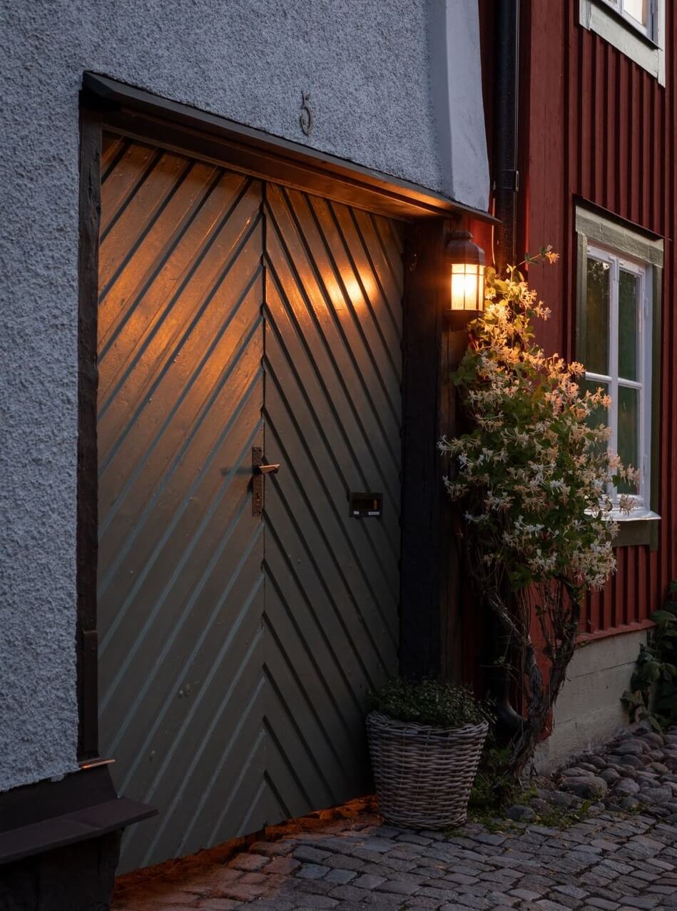 A Monochrome Nordic Home with Cozy Courtyard 23 entrance-gate-historic-home-sweden-nordroom