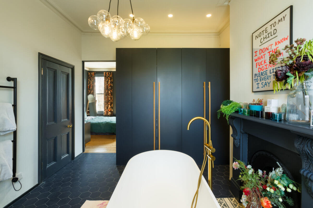 A Combination of Styles and Color in a London Townhouse 24 freestanding-bath-blue-bathroom-black-hexagon-floor-tiles-nordroom