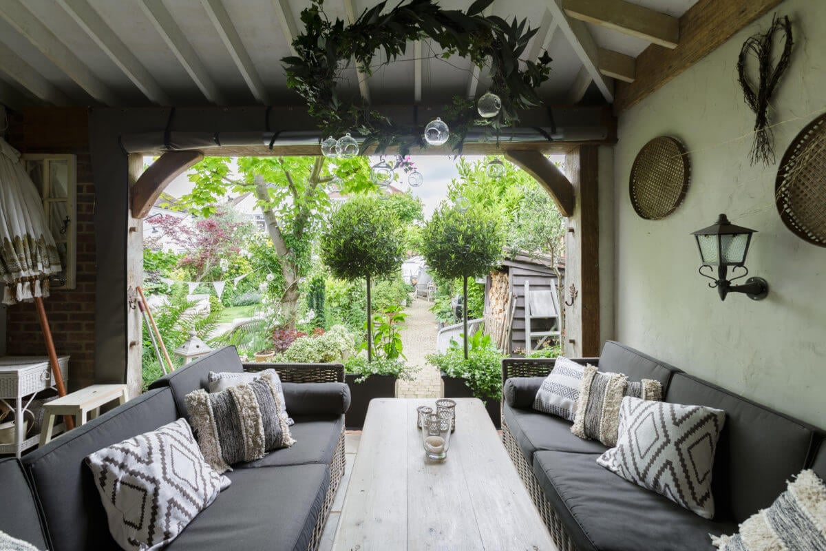 A Cozy Cottage-Style Country House with a Lovely Garden 26 garden-house-sitting-area-nordroom