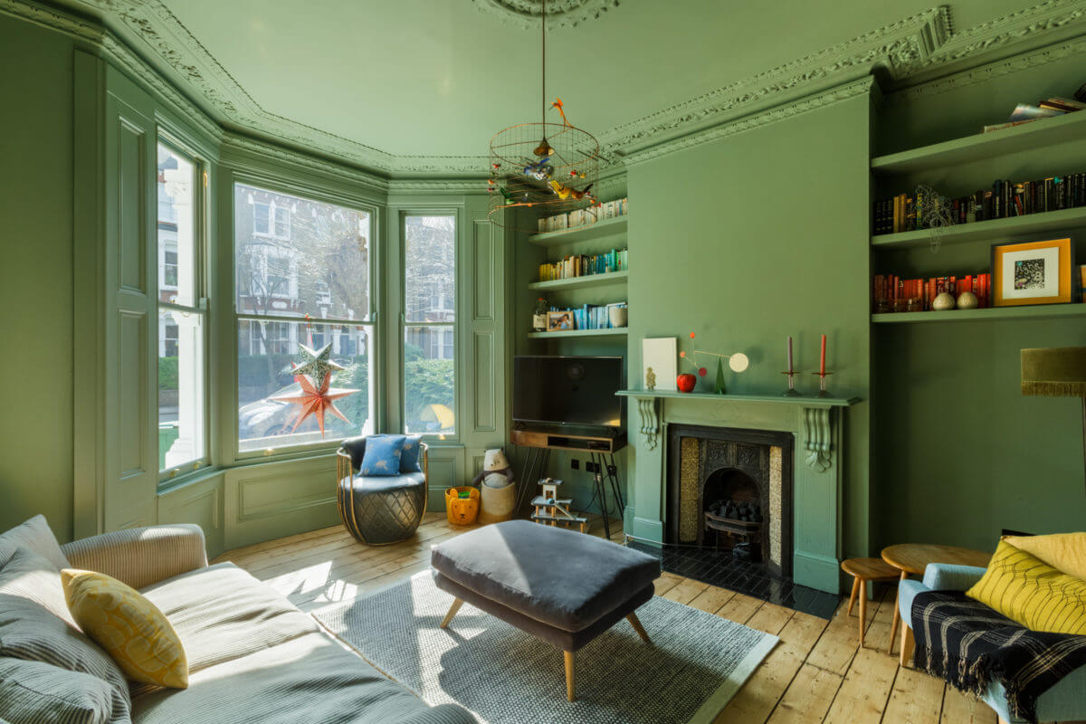 A Combination of Styles and Color in a London Townhouse 11 green-sitting-room-fireplace-bay-window-ceiling-ornaments-nordroom
