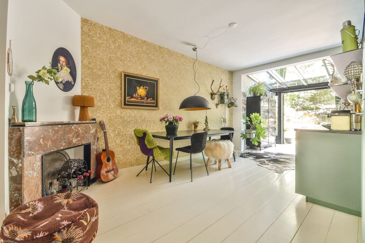 A Bright Colorful Home in Amsterdam 5 kitchen-dining-area-gold-wallpaper-fireplace-nordroom