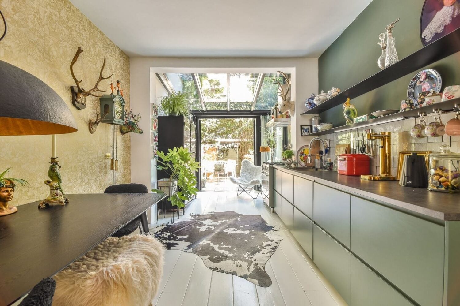 A Bright Colorful Home in Amsterdam 9 kitchen-green-cabinets-white-floor-gold-wallpaper-nordroom