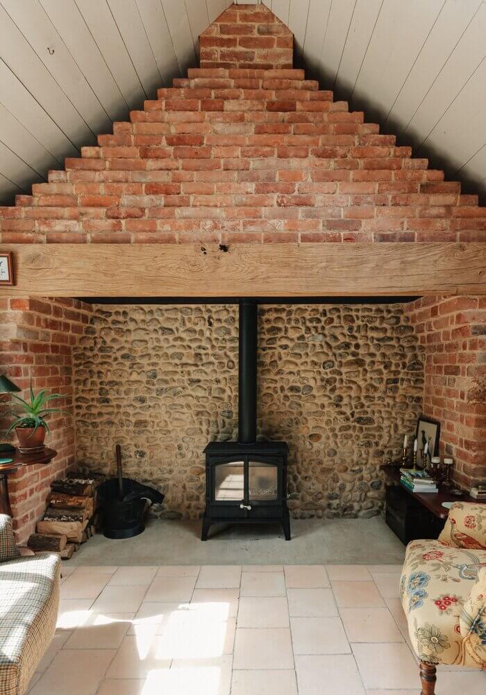 Spinks Nest: A Small Vintage Cottage in England 14 large-stone-fireplace-vintage-english-cottage-nordroom