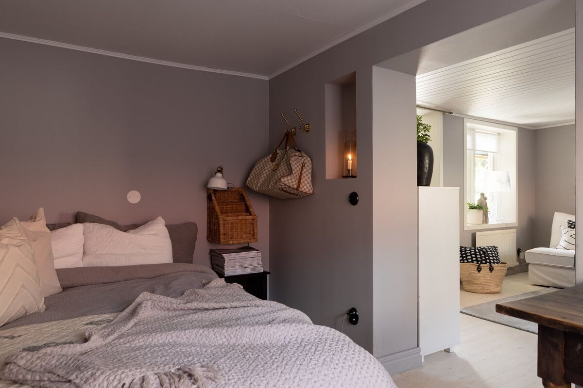 A Monochrome Nordic Home with Cozy Courtyard 17 light-gray-bedroom-sitting-area-nordroom