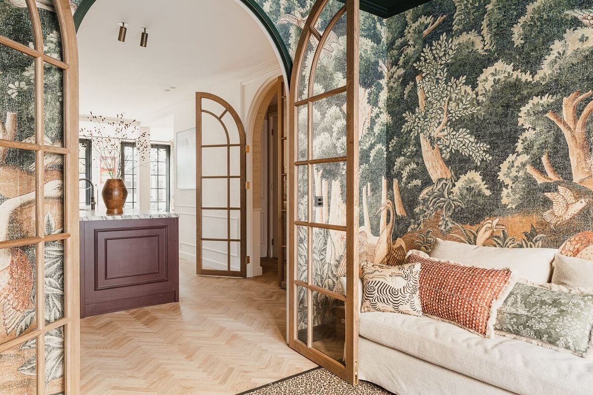 Color and Wallpaper in a Stylish Amsterdam Home 3 living-room-arched-doors-iksel-birds-tapestry-nordroom