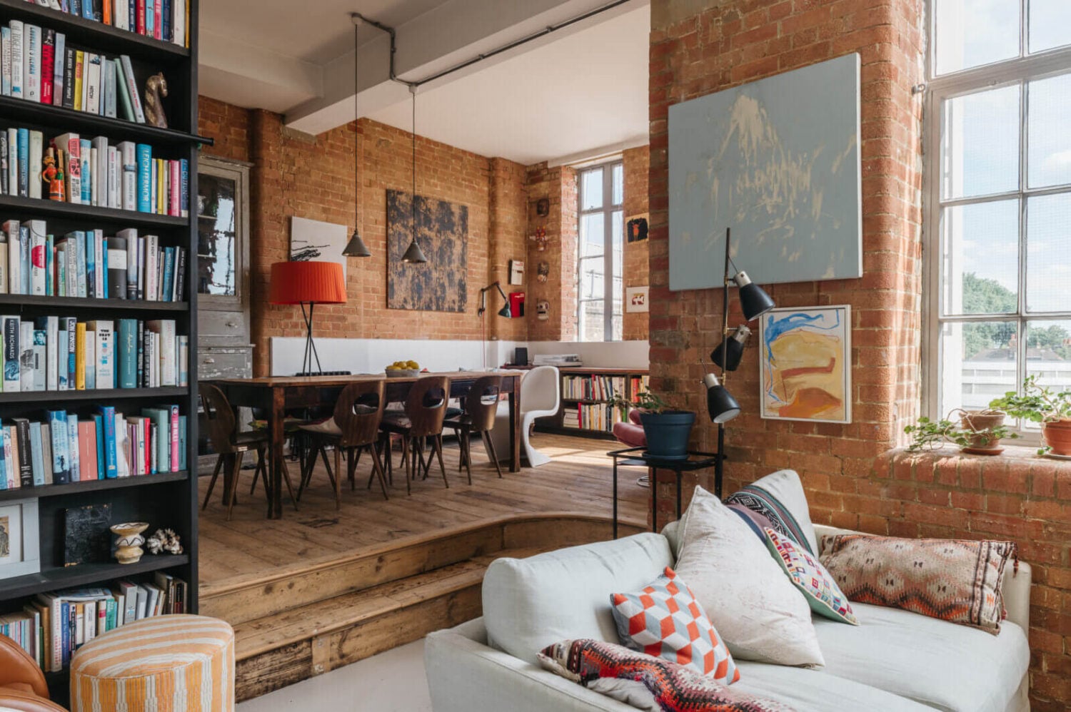 A Loft-Style Apartment with Brick Walls in London 6 loft-style-living-space-industrial-brick-walls-bookshelves-nordroom