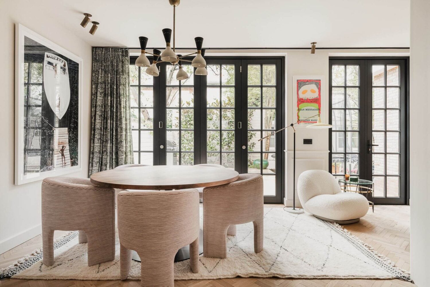 Color and Wallpaper in a Stylish Amsterdam Home 7 modern-dining-room-round-table-nordroom
