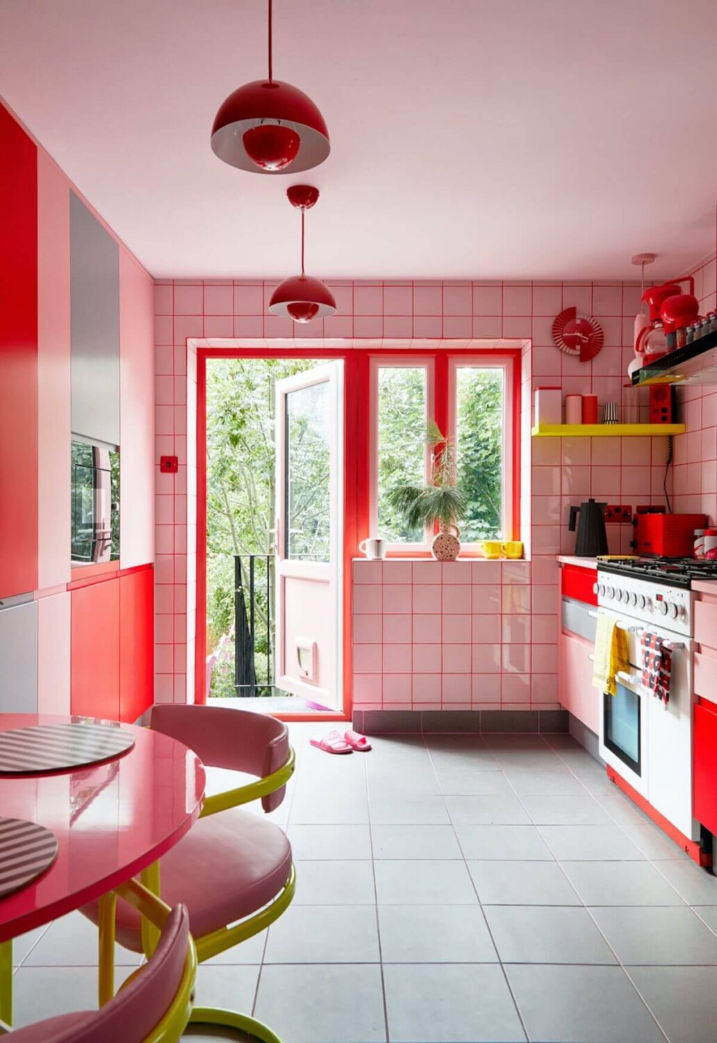 A Quirky London Home Decorated with Neon Colors 3 pink-red-kitchen-quirky-london-home-nordroom