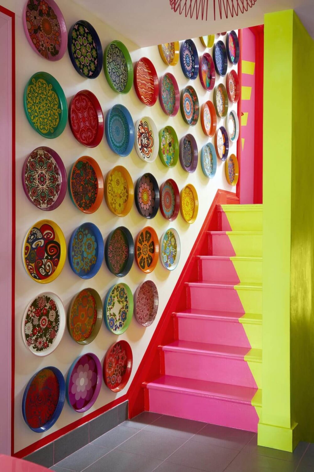 The 2026 Home Decor and Color Trends, According to Pinterest 24 pink-yellow-staircase-plates-wall-decor-nordroom