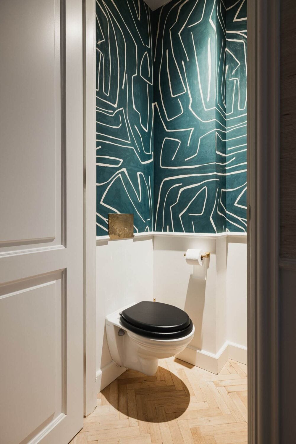 Color and Wallpaper in a Stylish Amsterdam Home 12 powder-room-green-wallpaper-amsterdam-townhouse-nordroom