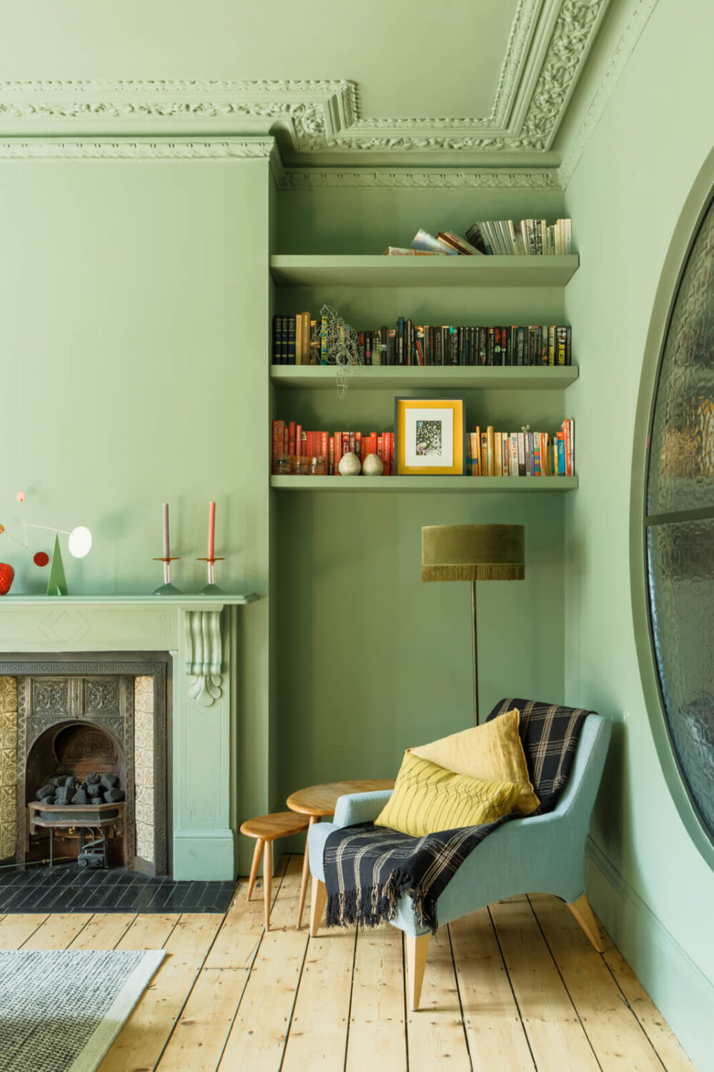 A Combination of Styles and Color in a London Townhouse 14 reading-nook-shelves-fireplace-green-sitting-room-wooden-floor-nordroom