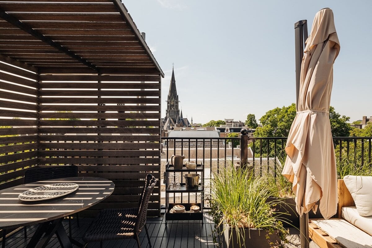 Light Gray Design Apartment in Amsterdam 26 roof-terrace-dining-area-nordroom