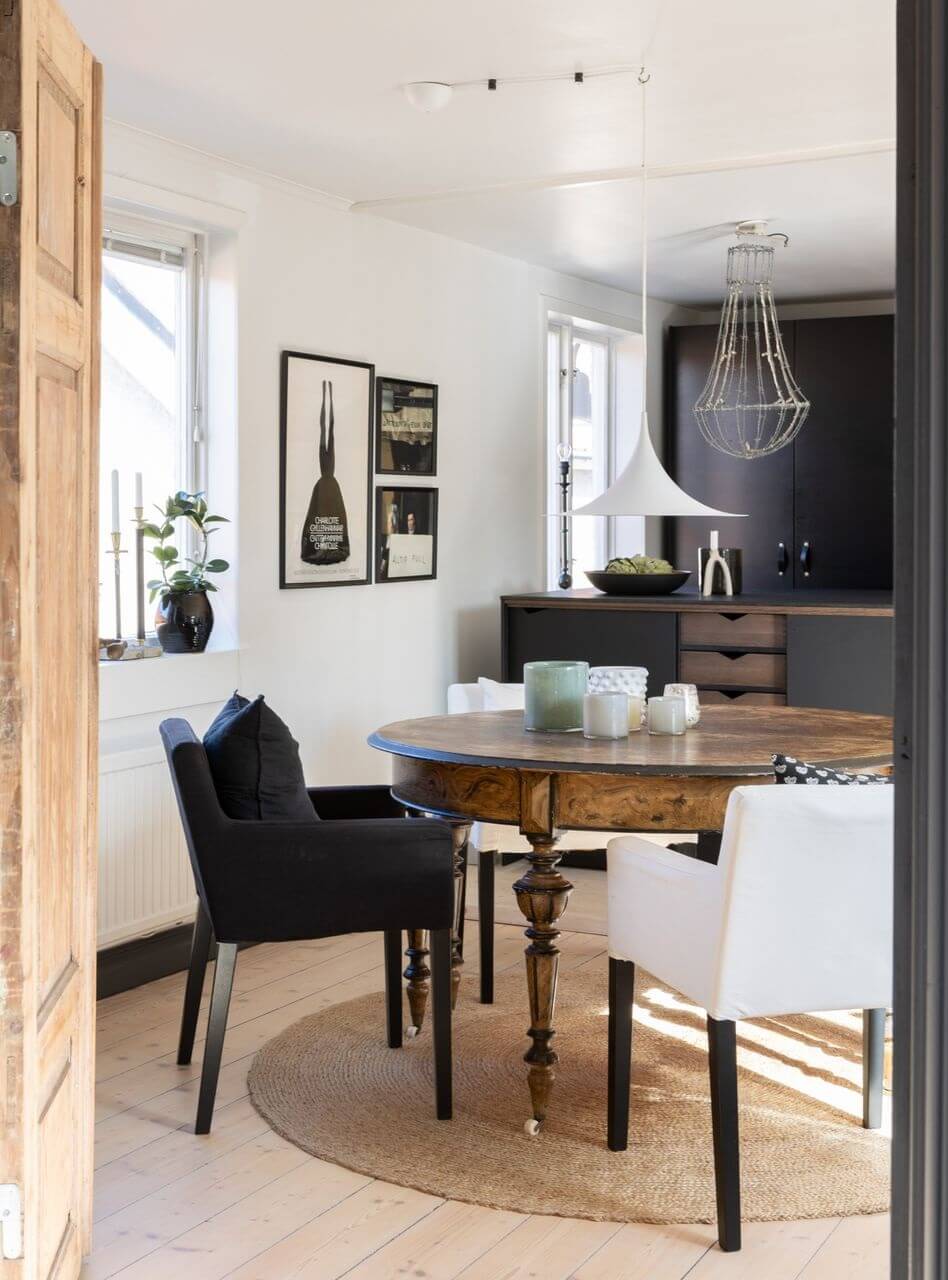 A Monochrome Nordic Home with Cozy Courtyard 4 round-wooden-dining-table-kitchen-monochrome-nordic-home-nordroom