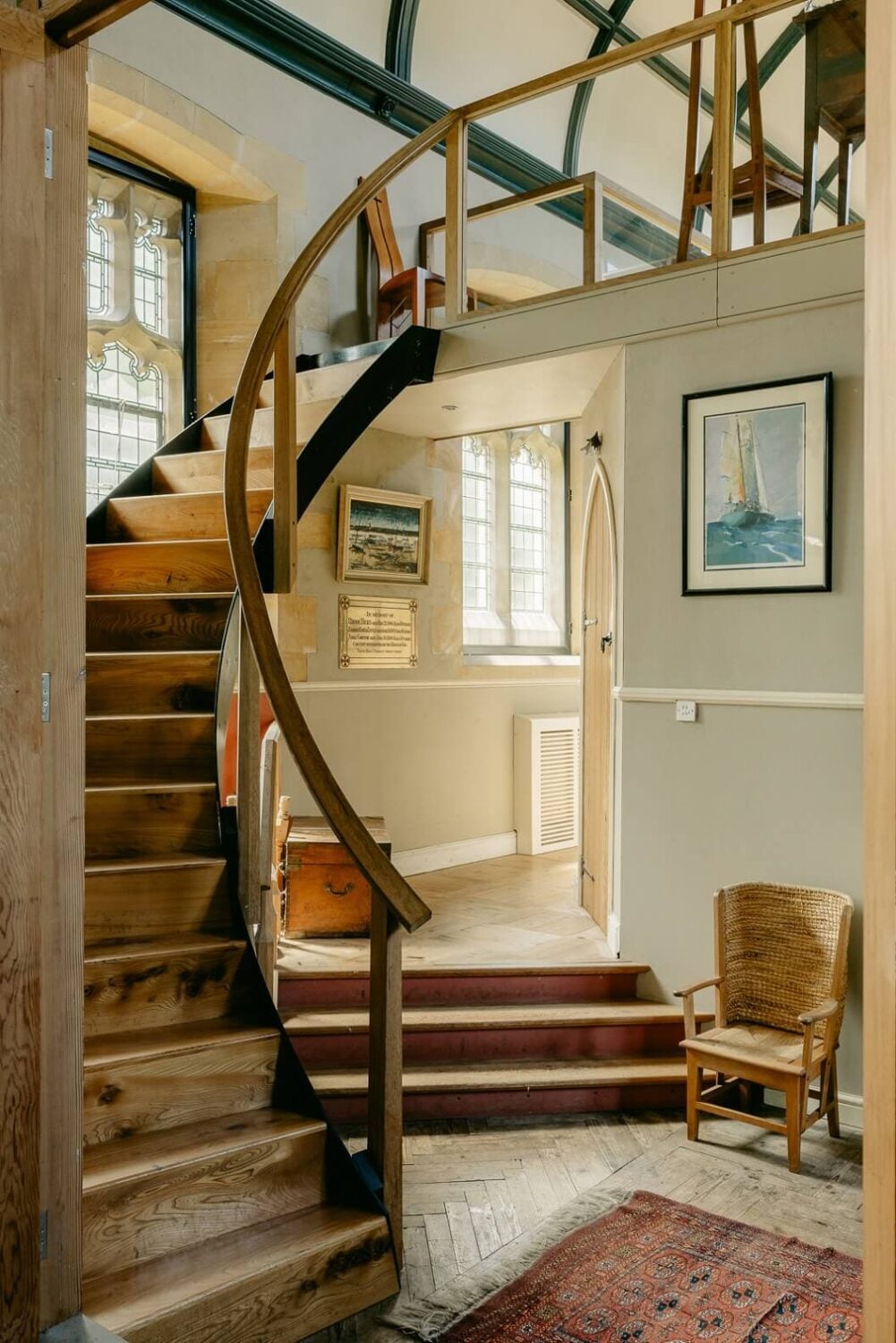 A Warm Church Conversion in England 12 round-wooden-staircase-church-conversion-england-nordroom