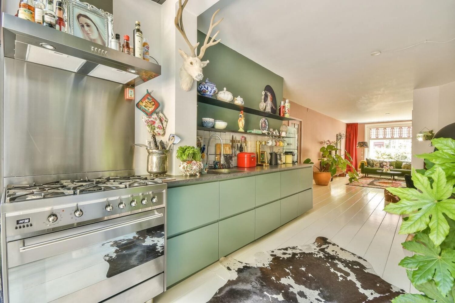 A Bright Colorful Home in Amsterdam 8 sage-green-kitchen-cabinets-nordroom