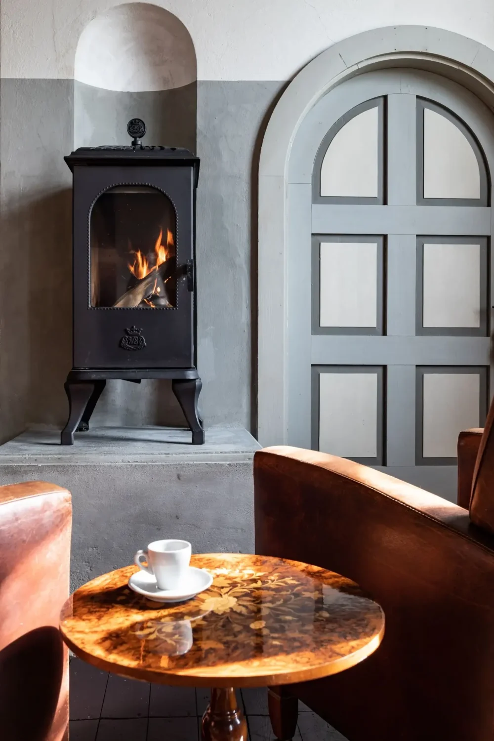 A Beautiful Chapel Conversion in Sweden 8 sitting-area-fireplace-church-conversion-sweden-nordroom