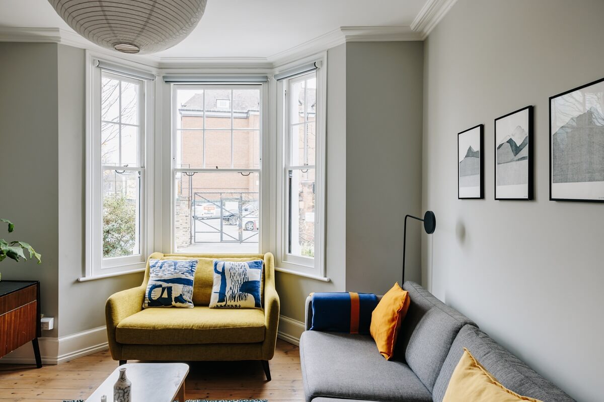 A London Townhouse with Blue Kitchen and Light Extension 11 sitting-room-bay-window-gray-walls-nordroom