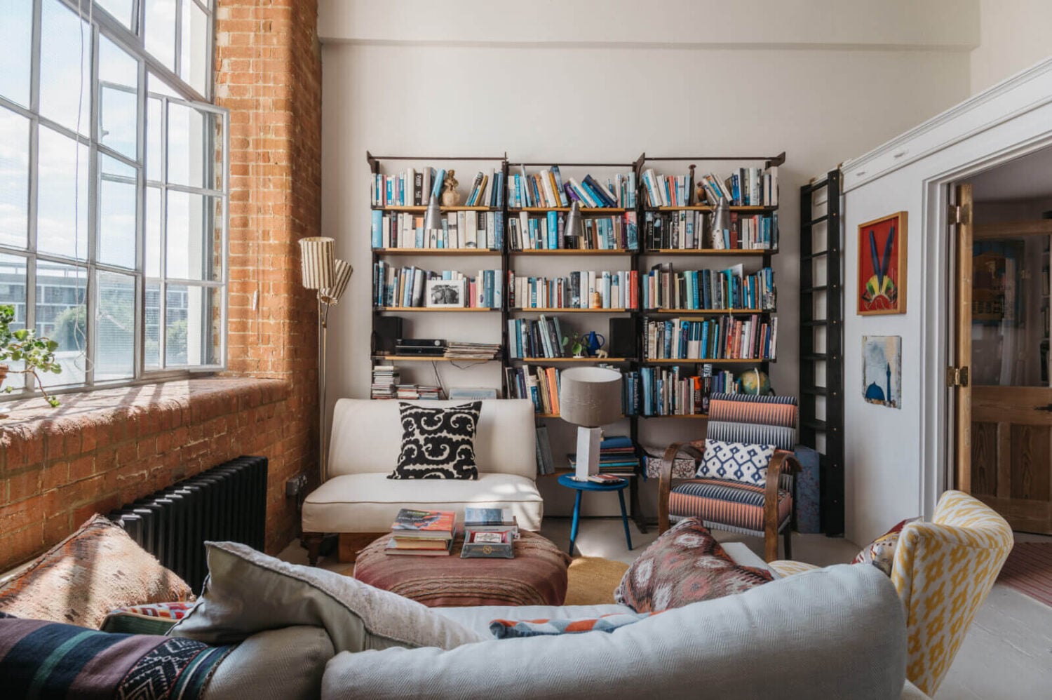 A Loft-Style Apartment with Brick Walls in London 4 sitting-room-london-flat-industrial-window-nordroom