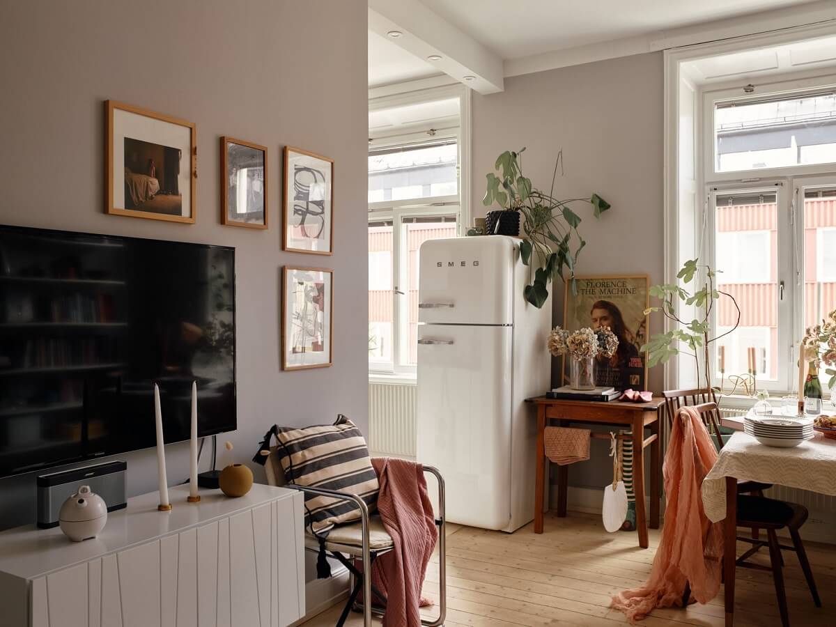 A Small Swedish Apartment with Ochre Yellow Sofa 6 small-sitting-room-light-gray-walls-nordroom