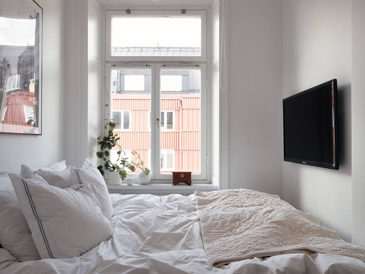 A Small Swedish Apartment with Ochre Yellow Sofa 14 small-white-scandinavian-bedroom-nordroom