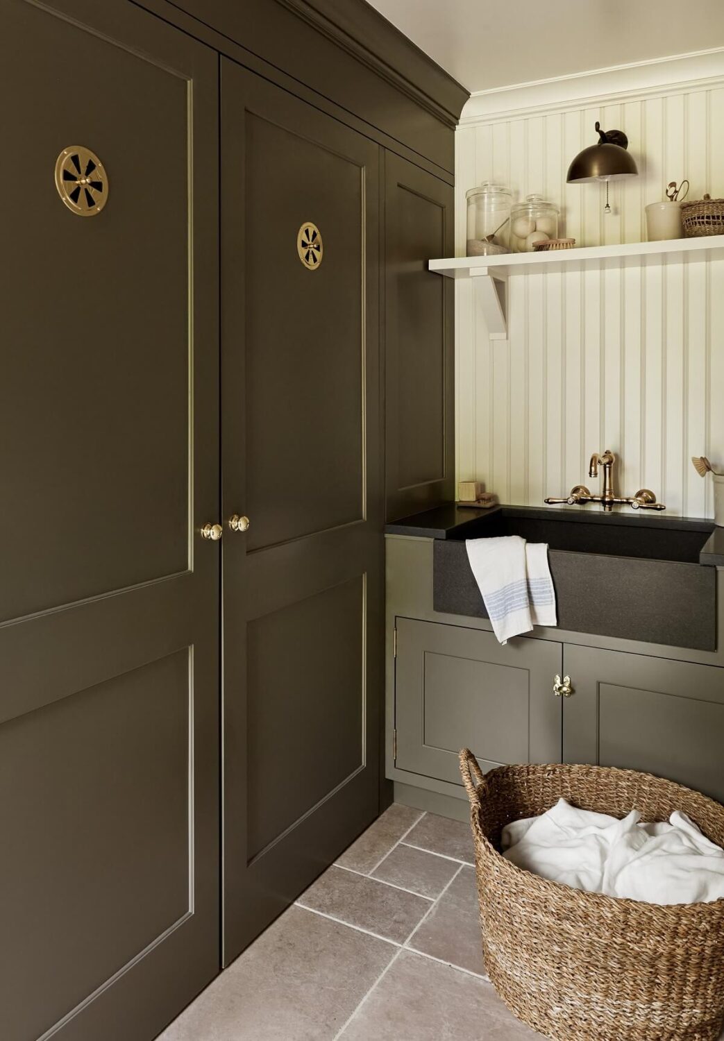 A Bedford Colonial Decorated in Warm Neutrals 16 utility-room-gray-cabinets-nordroom