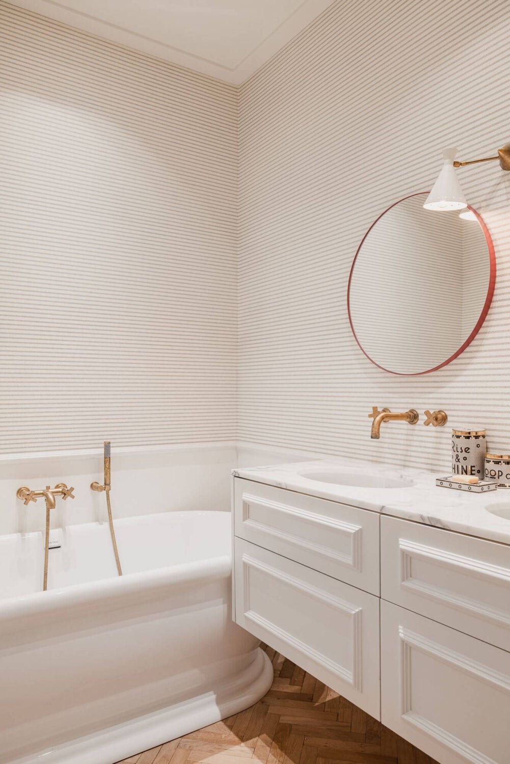 Color and Wallpaper in a Stylish Amsterdam Home 17 white-bathroom-freestanding-bath-round-mirror-nordroom