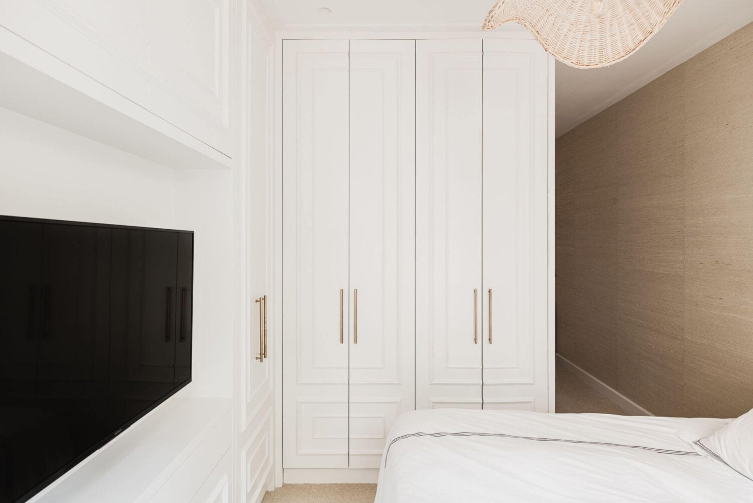 Color and Wallpaper in a Stylish Amsterdam Home 15 white-natural-master-bedroom-built-in-wardrobes-nordroom