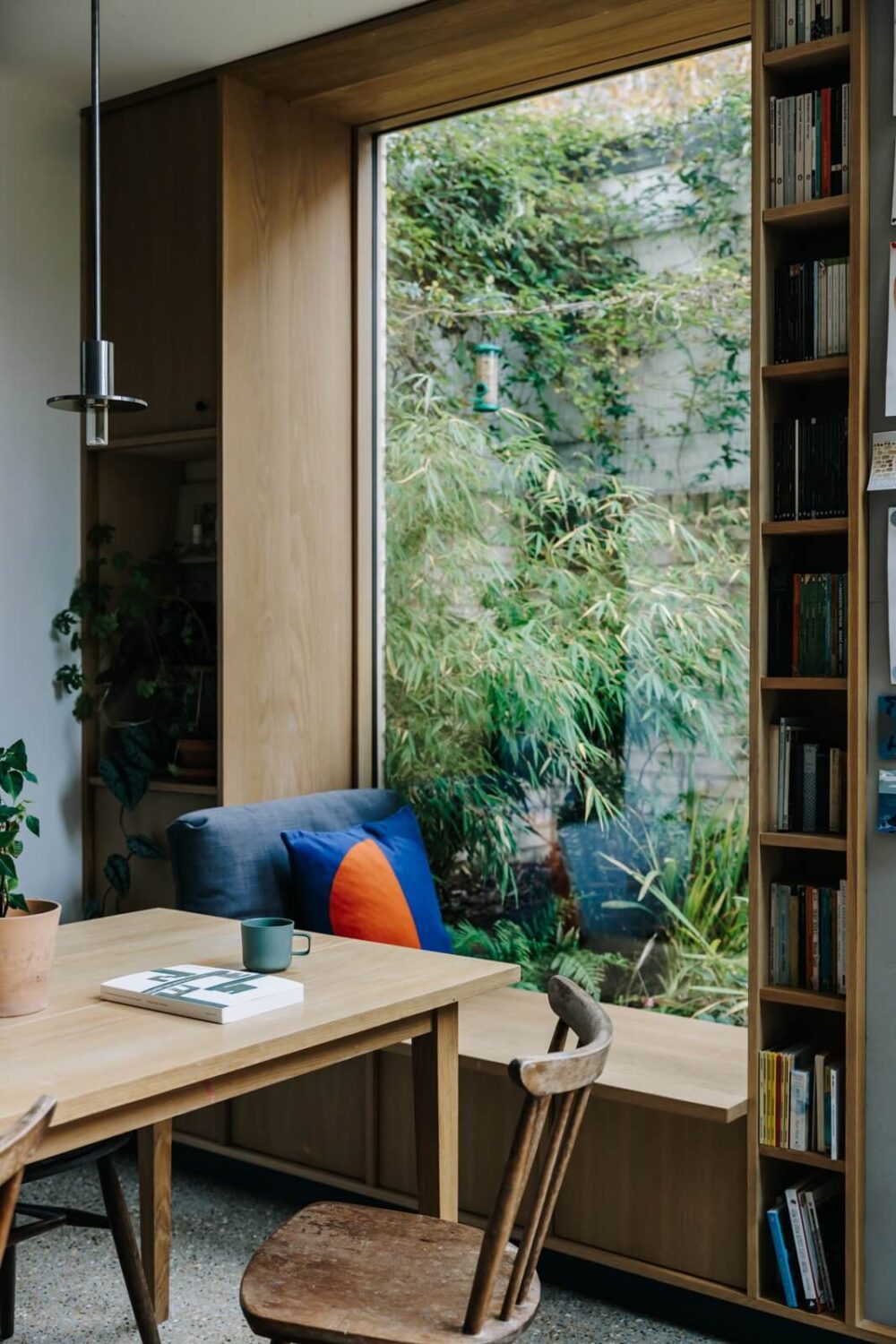 A London Townhouse with Blue Kitchen and Light Extension 5 window-seat-bookcase-extension-london-townhouse-nordroom