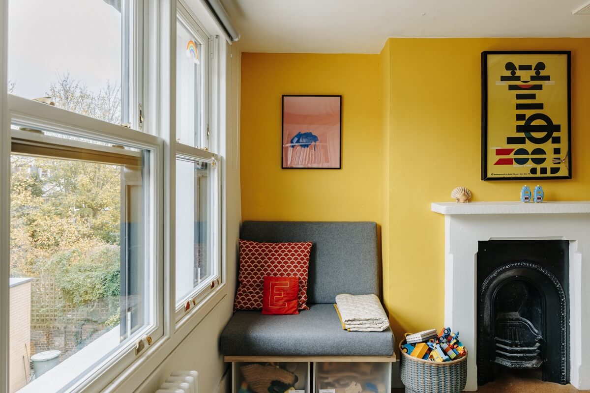 A London Townhouse with Blue Kitchen and Light Extension 17 yellow-kids-bedroom-fireplace-reading-nook-nordroom
