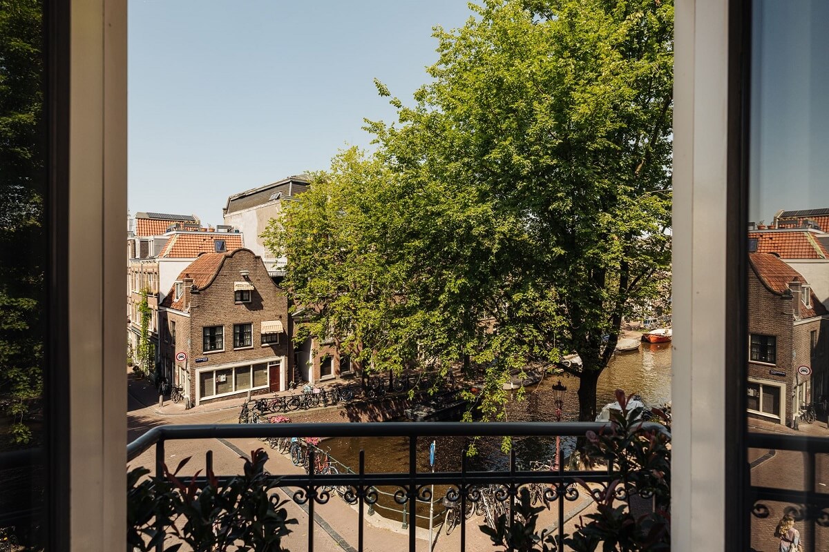A Luxurious Canal House in Amsterdam 11 balcony-view-amsterdam-canal-nordroom