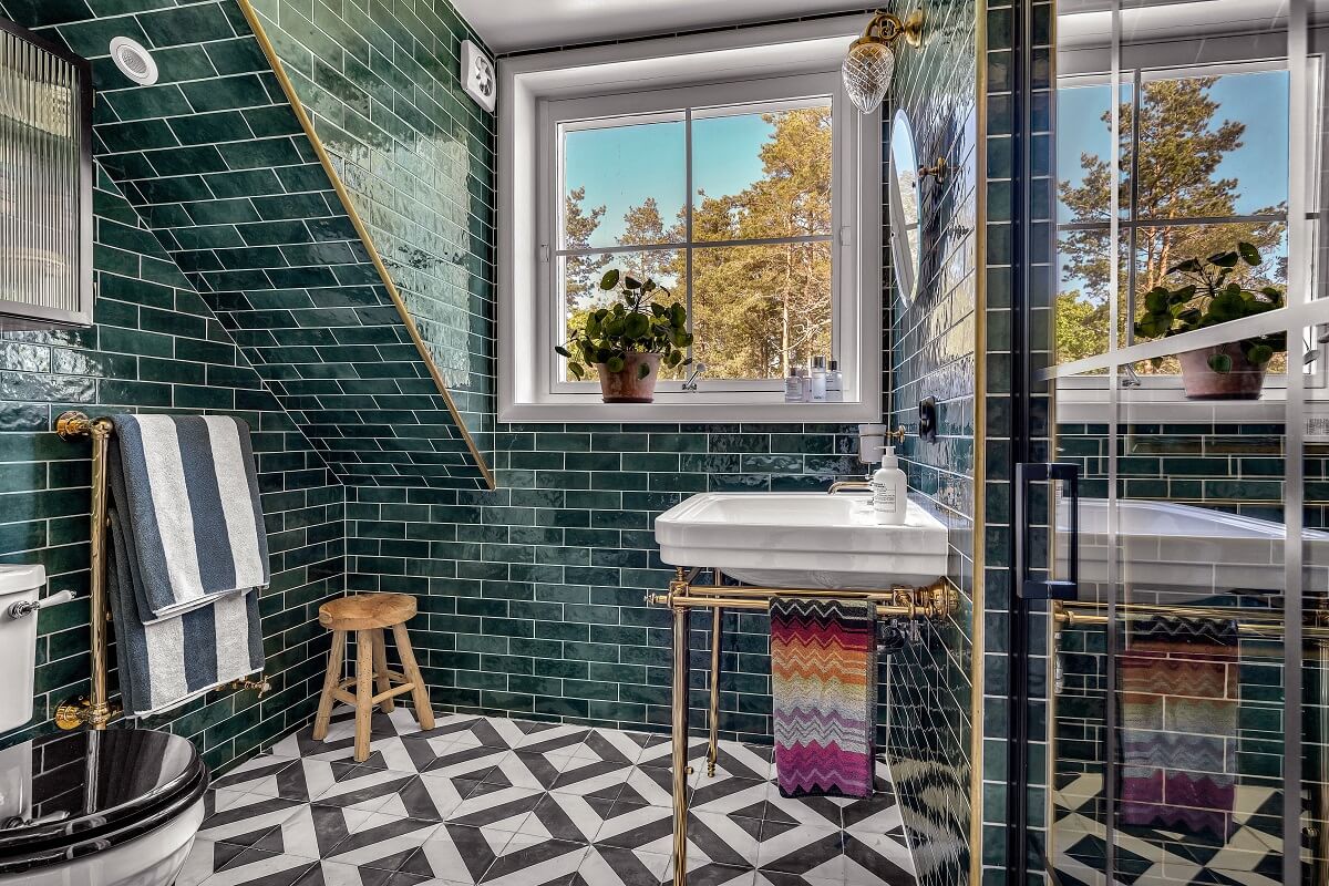Inspiring Bathrooms With Geometric Tiles 15 bathroom-sloped-ceiling-green-tiles-nordroom