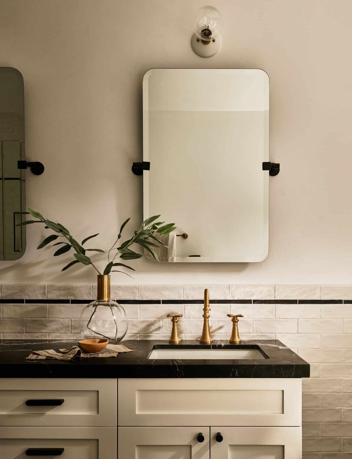 Warm Neutrals in a Lovely Home in Silver Lake, Los Angeles 21 bathroom-vanity-black-marble-nordroom