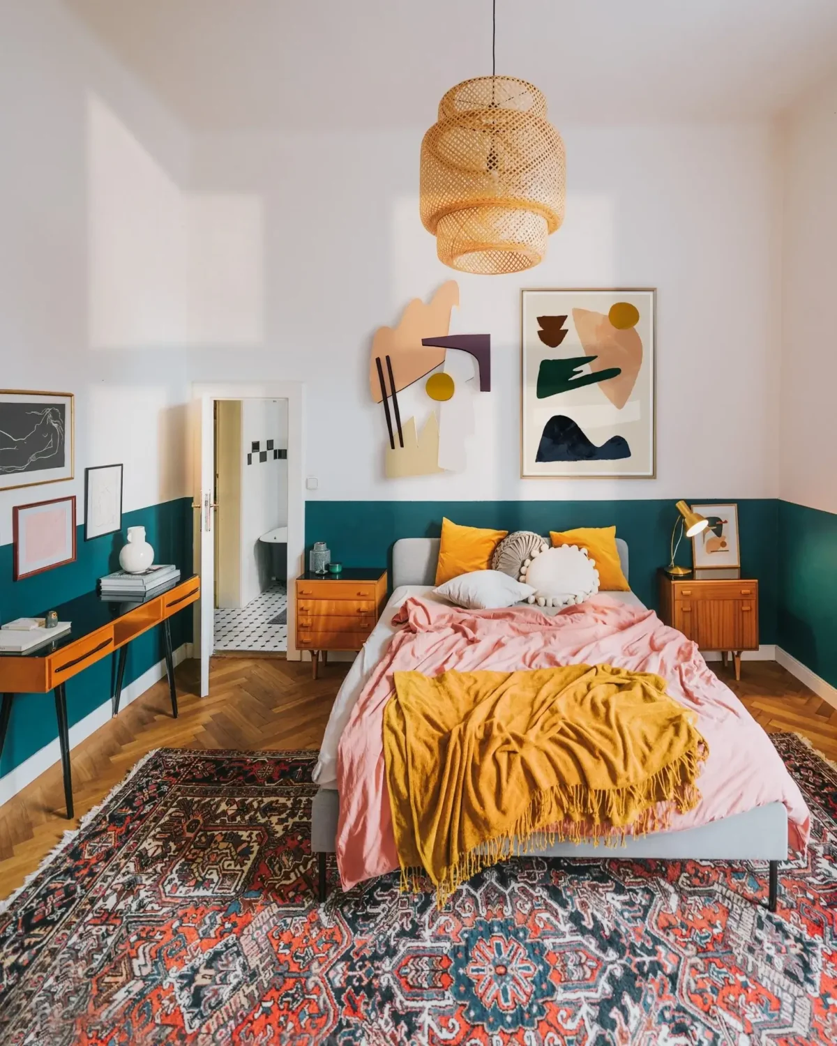 Glidden & PPG Color of the Year 2023: Vining Ivy 3 bedroom-half-painted-teal-wall-ochre-pink-bedding-large-rug-nordroom