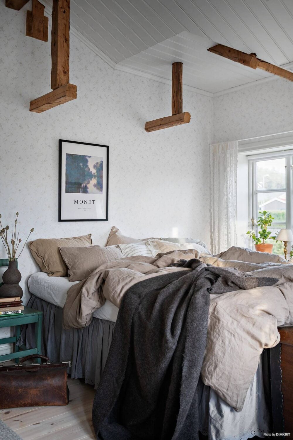 A Charming Swedish Villa Filled with Wallpaper 15 bedroom-wooden-beams-swedish-country-house-nordroom